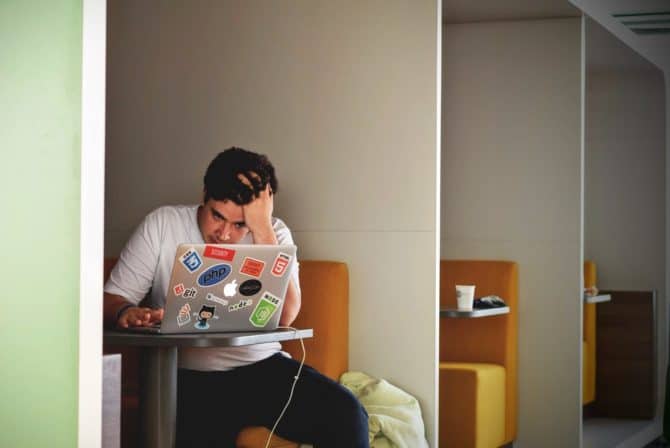 marketing strategy frustrated man with laptop