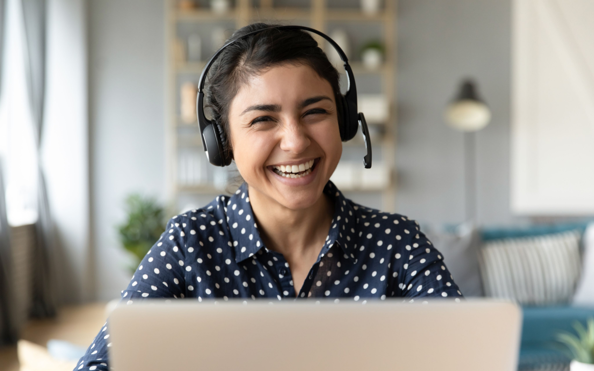 Woman smiling while working on translation service